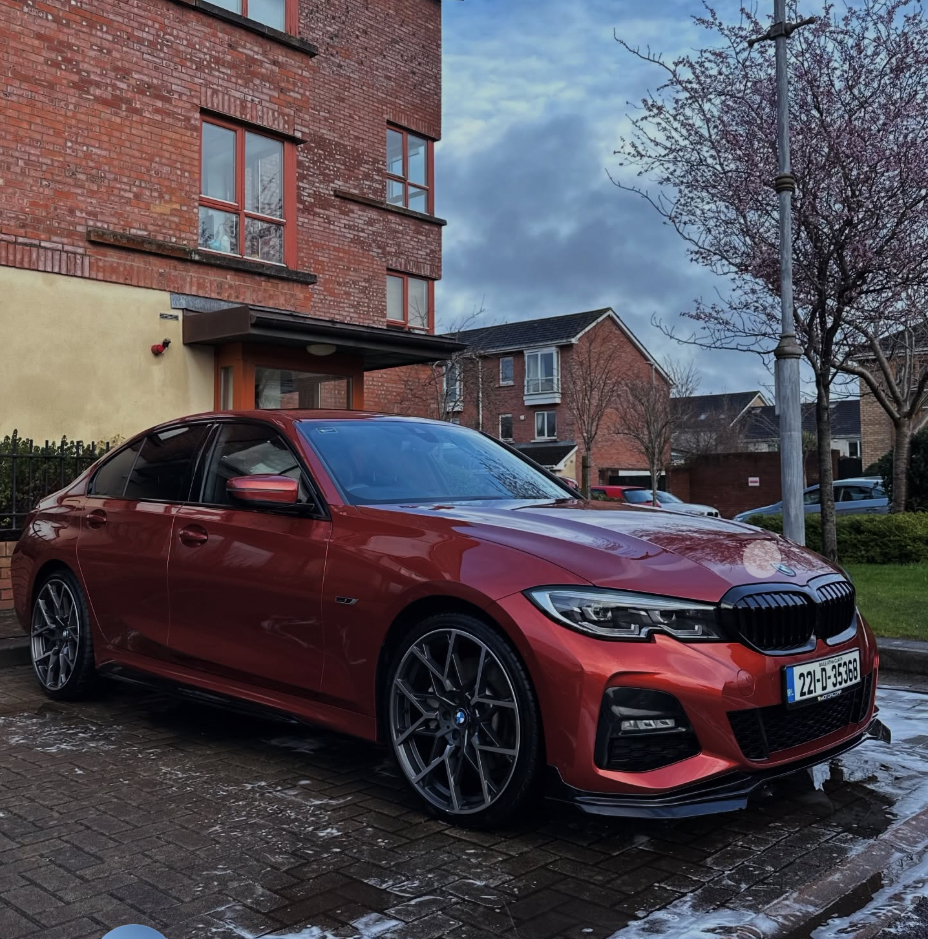 Sunset Orange BMW 3 Series freshly valeted