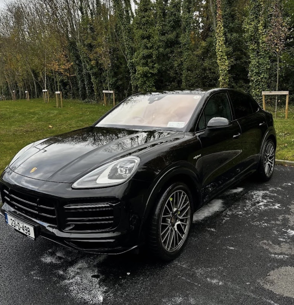 Black Porsche Cayenne Coupé detailed to a deep gloss